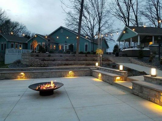 Backyard sitting area with firepit. Paver patio