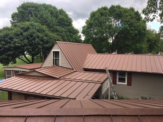 Western Rust steel roof on our home.  Done by Roof Masters Plus of Lafayette.  Love It!