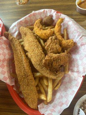 We had another basket for the rest of the food. 3 fish, 3 shrimps, and 3 oysters with fries, red beans & rice.