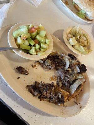 Hamburger steak, cucumber salad, smothered cabbage