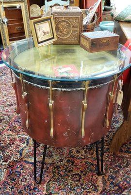 Really neat drum side table with display area under the glass.