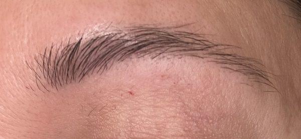 More unpulled hairs, jagged shape AND raw skin