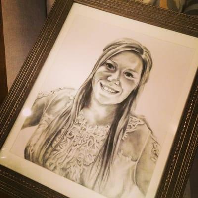 This is a charcoal portrait we did for a beautiful bride to display at the reception of her wedding!