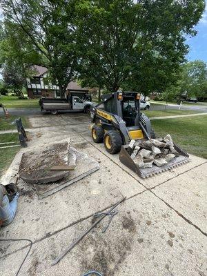 Taking out old concrete patio