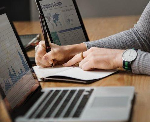 Accountant reviews a client's annual report before an appointment