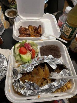 Beefsteak and onions. The fried plantains are the best ever yummie