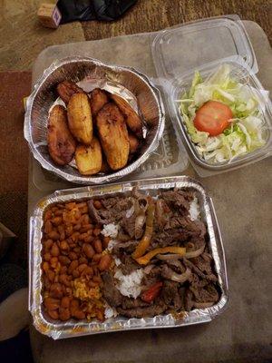 Bistec Encebollado, rice, beans , (maduro) sweet plantains, salad