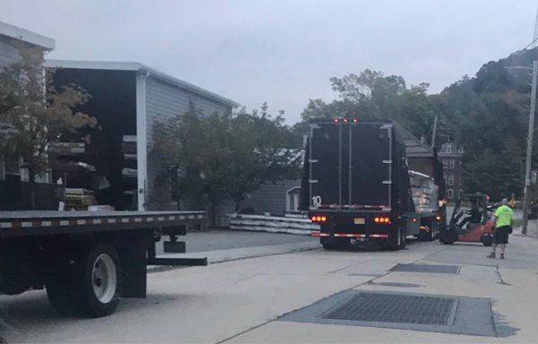 Blocking the road to unload the trucks