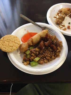 Egg roll, cashew chicken, fried rice with sesame chicken and an almond cookie for dessert.