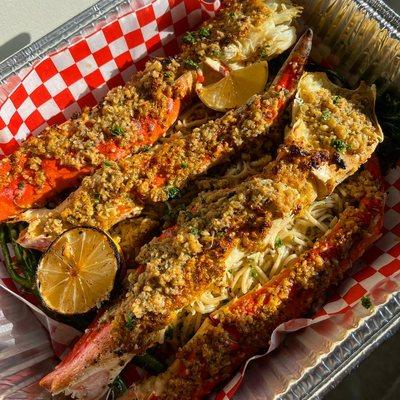 Roasted Garlicand Herb Alaskan King Crab over Garlic Noodles