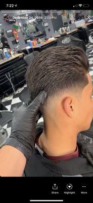 Low low fade with a slick back style