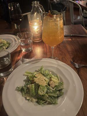 Caesar salad and apricot spritz