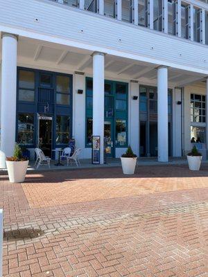 Main entrance. Outdoor seating on central plaza