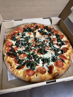 Medium pizza with pepperoni and spinach