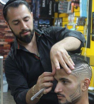 Avi Benjamin owner and barber of the underground barbershop & Salon