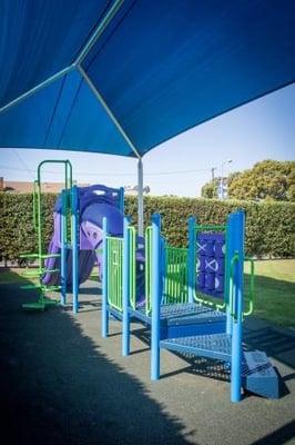 Our covered play structure is often referred to as "the park" by our students.