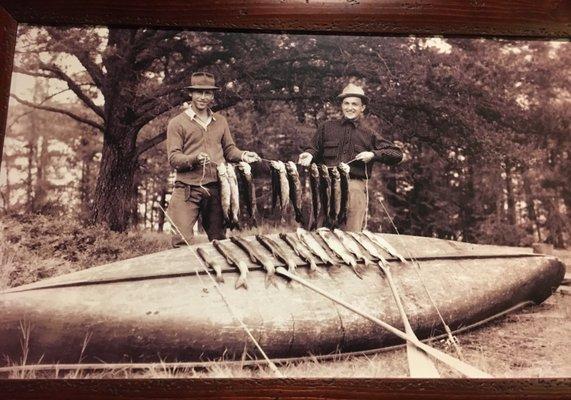 What a great old fishing picture, before conservation and wildlife protection.