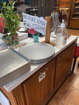 Take a tray and tongs to select your bread