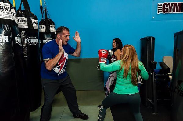 Coach Coleman training a group Boxing class.