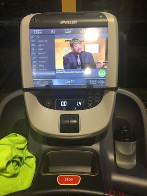 treadmill has its own television, phone charger, 2USB inputs for watching your own media if you want, and a headphone plug to watch DirecTV