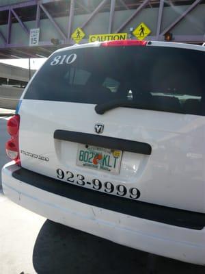 The license plate and cab number for the vehicle whose driver tried to scam us: 802 KLT