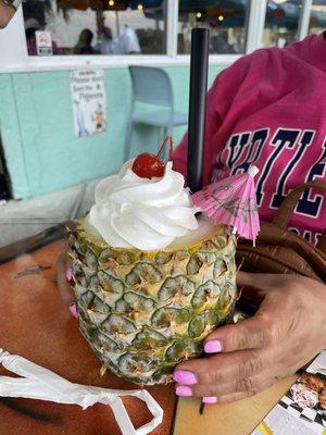 pina colada in a pineapple