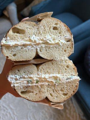 Poppyseed bagel with scallion cream cheese