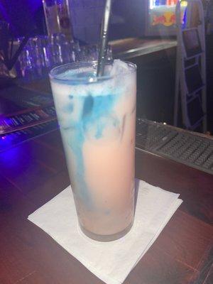 vodka, pineapple, strawberry, banana liquor and Blue curaçao