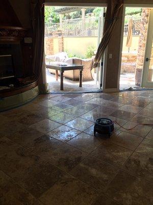 Polishing travertine floors , cleaning , honing for scratch removal and then an awesome impregnator sealer