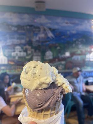 Black raspberry and pistachio on a waffle cone