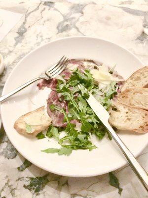 Seared Rare Wagyu Beef Carpaccio ($19) arugula, shaved fennel, and Parmesan