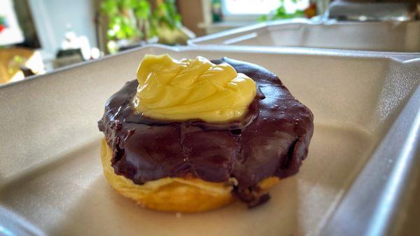 Custard filled donut.  Don't mis judge the proportions.  This donut is about 6" in diameter.  Enjoy!