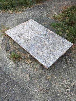 Board over a manhole