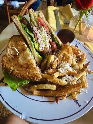 Turkey club sandwich with truffle fries