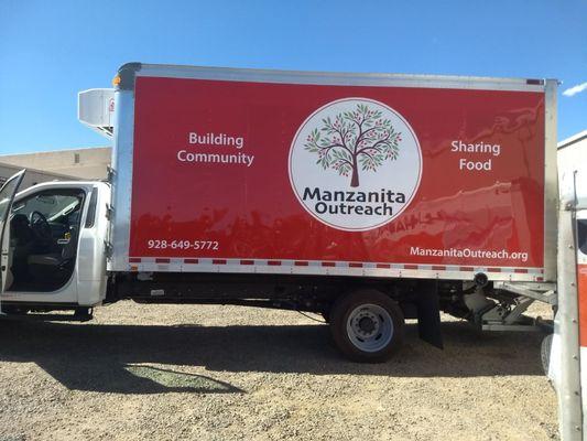 With employee, Jason and his wife's help we were able to unload our smashed UHaul into this truck to get our donations to Manzanita Outreach