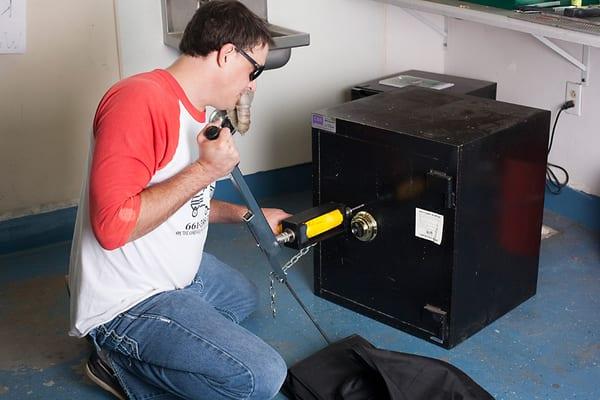 Bakersfield Mobile Locksmith Drilling a commercial safe,  we do damage free safe opening for most safes..