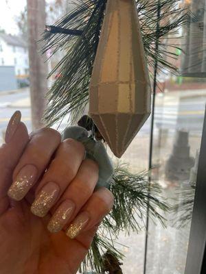 Beautiful sparkly holiday nails. Lily did a beautiful job. She used 4 different glitters. The picture doesn't do them justice.