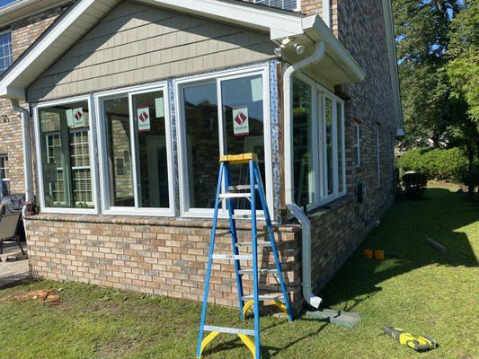 Sunroom window and door install , very pleased customers