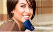 This young lady looks like she's enjoying her SAFE visa debit card!