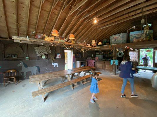 Inside the barn for lunch, cake, drinks, and gifts!