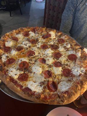 Large pizza with pepperoni, sausage and ricotta