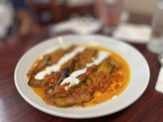 Borani Banjan (egg plant with tomatoes and spice and cream.