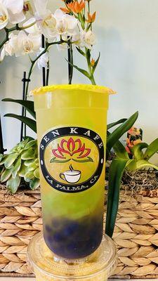 Mango Coconut refresher with green apply jelly and ube boba