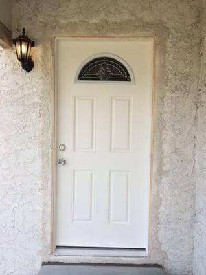 Front door replacement, it was thrashed prior to the replacement. The stucco was still wet in this photo and is pretty well color matched.