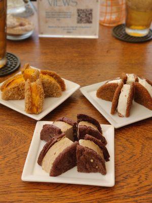 Ice cream sandwiches! From left to right: Mango with oatmeal cookie, coffee with chocolate cookie, and ginger cookie with something idk