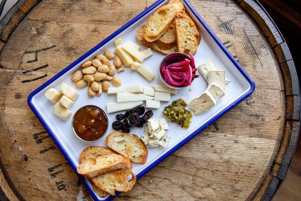 Charcuterie Plate: Assorted Meats from Gagliano's and Cheeses from Springside, featuring Farm Fresh Pickles and Jams.