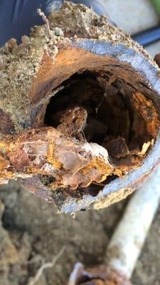 Aged brittle cast iron pipes break up on the inside. Snaking with blades in aged brittle cast iron pipes also contribute to added breakdown.