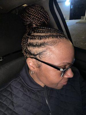 Medium Tribal Box Braids pinned up on top of my head. Styled by Trey.