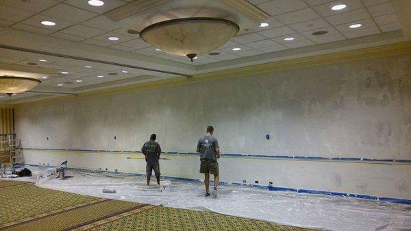 Removed wallpaper and smoothed out the wall in the ballroom