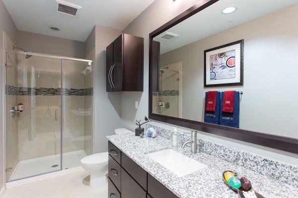 Spacious bathrooms with stand-up showers.